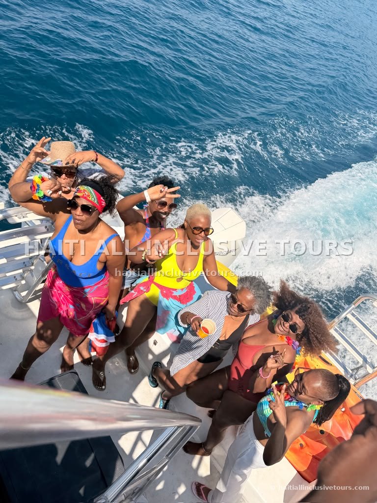 Guests celebrating on deck during the Northern Haiti boat excursion