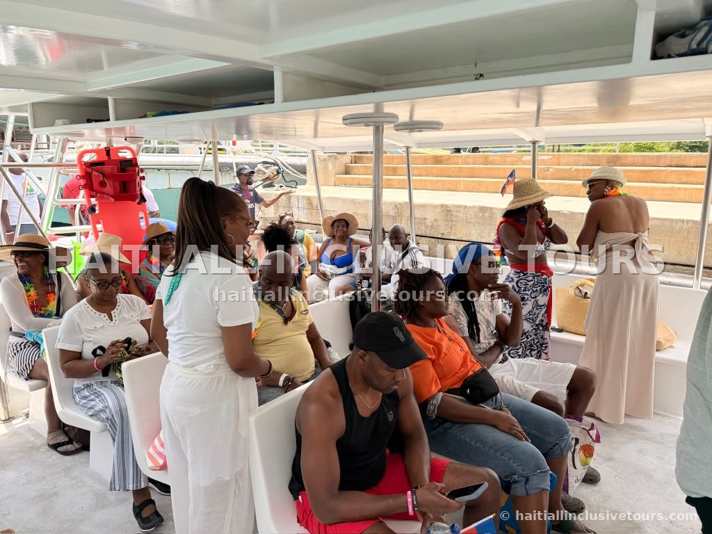 Guests settling in on the shaded deck for the Northern Haiti boat excursion