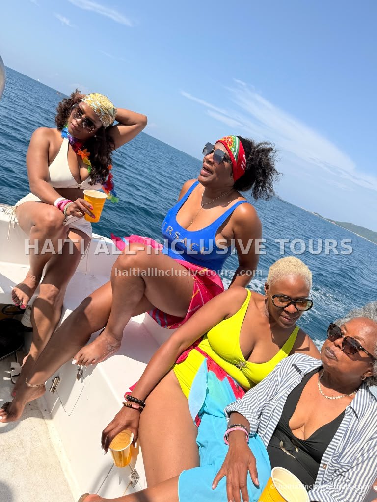 Guests relaxing with drinks on the boat during the coastal cruise